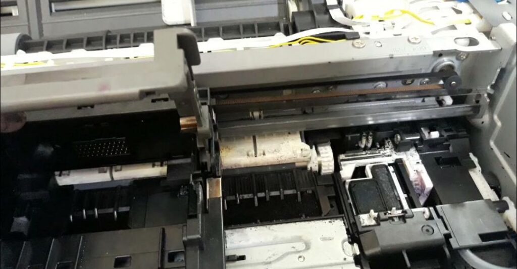 máy in canon nháy đèn vàng 15 lần