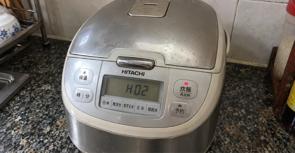 Nồi cơm điện Hitachi báo lỗi H02