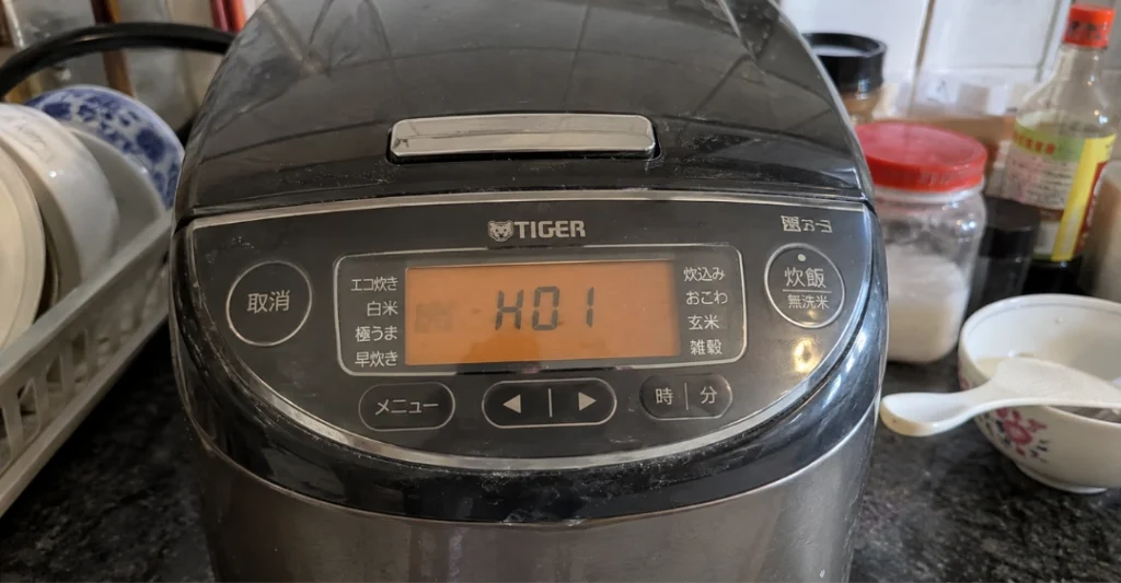 Nồi cơm điện Tiger báo lỗi H01